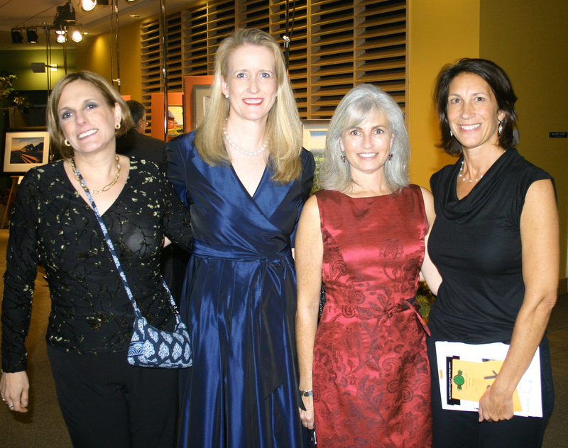 Event co-chairs Amy Hawkes and Karen Watterson, center, stand with past event chairs Stephanie Takes-Desbiens, left, and Kim Dorsky, right.