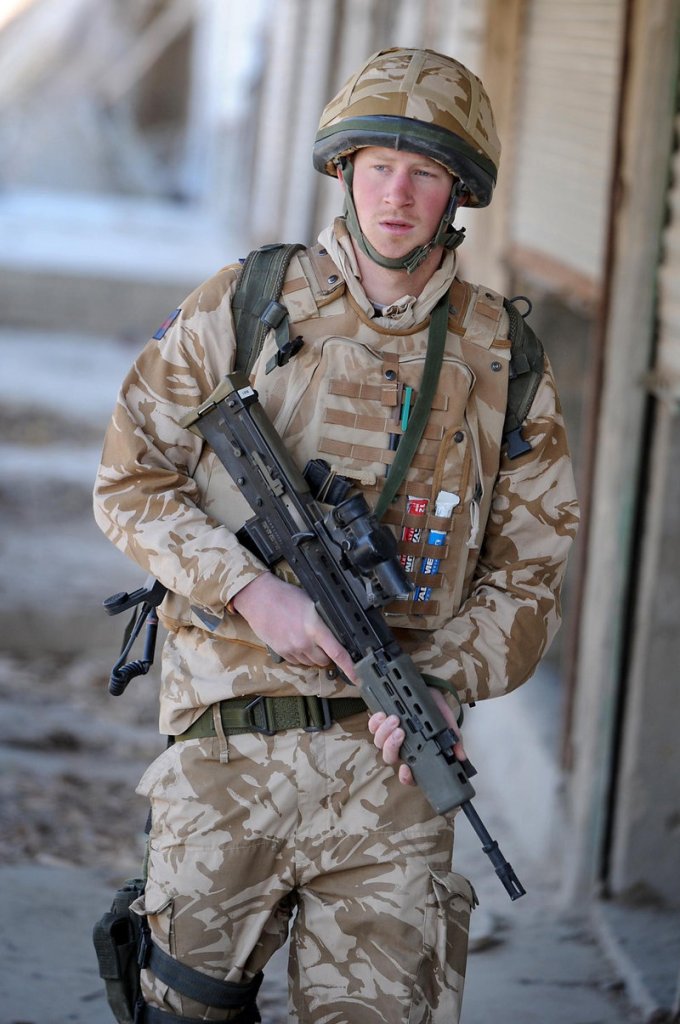 Prince Harry patrols the deserted town of Garmisir, southern Afghanistan, in this photo from 2008.