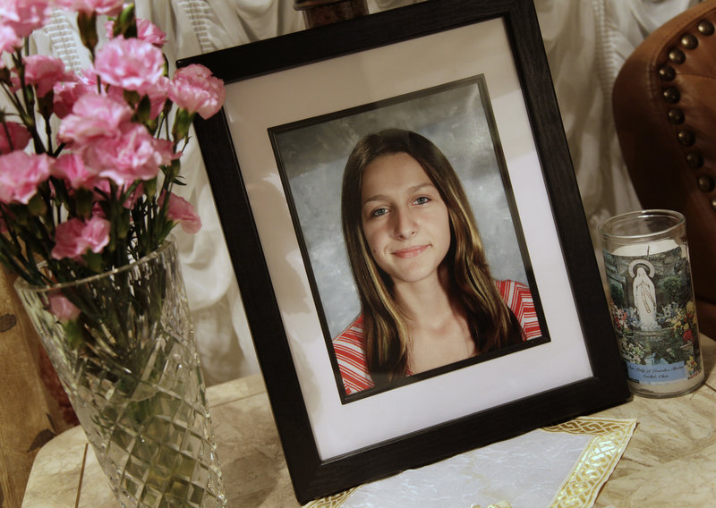 A portrait of Sladjana Vidovic, who committed suicide in 2008, sits in the living room of her family’s Mentor, Ohio, home. One of several Mentor High students who killed themselves in recent years, Sladjana “didn’t have enough strength” to withstand bullying at school, a friend says.