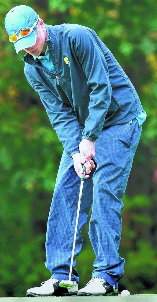 Connor Burfeind of Falmouth, putting on the 16th green Saturday, shot a 74 for the best overall score at the high school team golf championships at Natanis Golf Course. Falmouth won Class B by 12 shots.