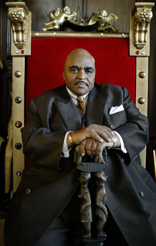 Solomon Burke poses in a red velvet throne in his Los Angeles home in 2005.