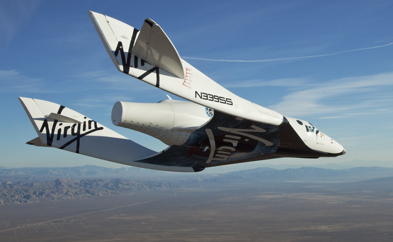 The Virgin Galactic SpaceShipTwo, or VSS Enterprise, glides to the earth on its first test flight. The craft, which is capable of blasting into space, was carried aloft and released by a mothership over the Mojave, Calif., area Sunday, then glided to a landing.