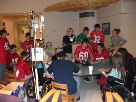 The Gray-New Gloucester Middle School football team recently visited the Barbara Bush Children’s Hospital at Maine Medical Center and presented a check for $2,500 from money raised by the team during its annual pledge drive.