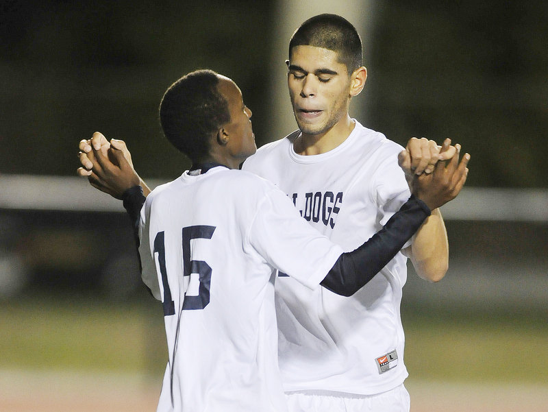 Fazal Nabi, right, who had two goals and an assist for Portland, celebrates Alan Tuyishime’s goal in the second half. The goal capped the victory and came with 4:10 remaining.