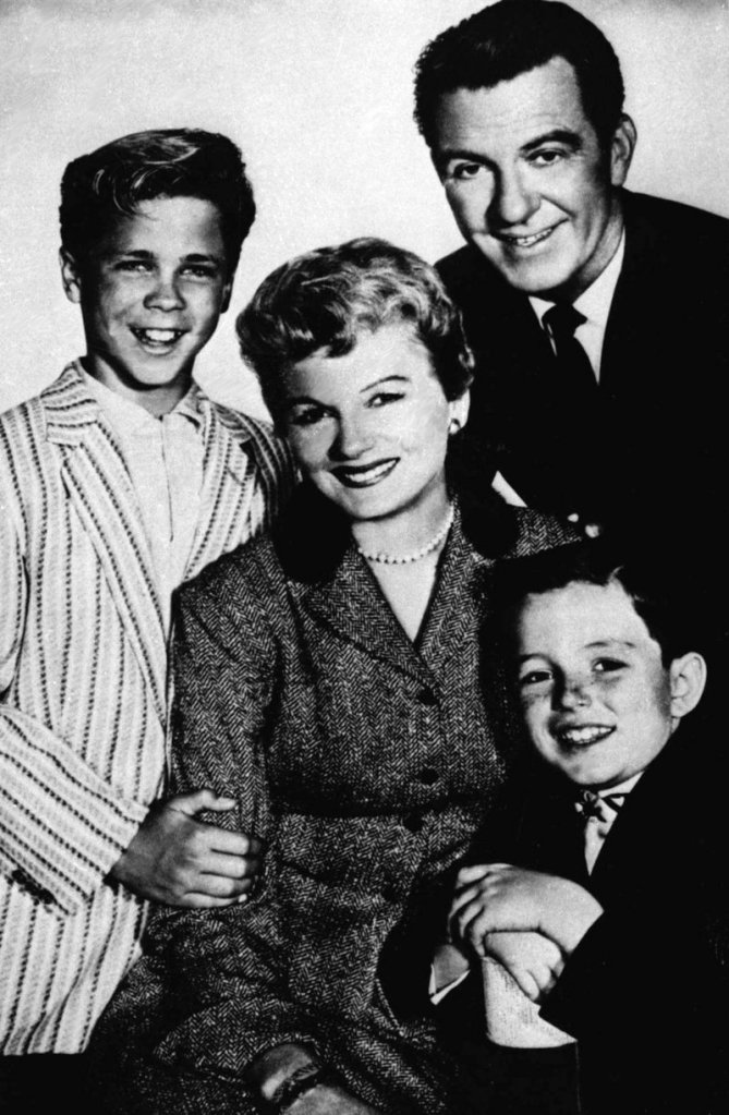 File photo shows, from left, Tony Dow as Wally, Barbara Billingsley as June, Hugh Beaumont as Ward and Jerry Mathers as the Beaver, the cast of the television series “Leave It to Beaver.”