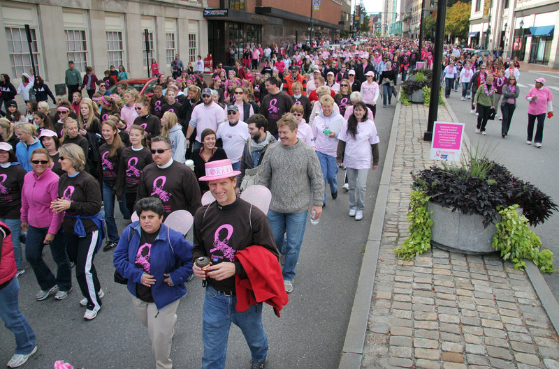 Teams of walkers filled Congress Street for the American Cancer Society's Making Strides Against Breast Cancer Walk in Portland on Sunday. The event benefits research, education and patient support efforts.