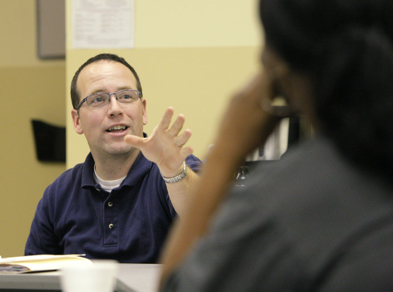 Aaron Geyer, the head of Portland's Workfare Program, holds an employment training session at the Portland welfare office last month.