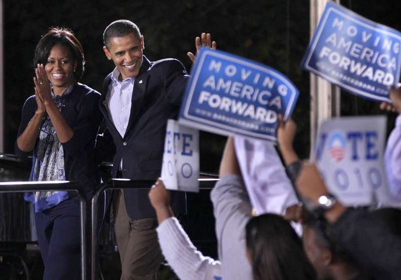 President Obama and first lady Michelle Obama muster support for Democratic candidates during a rally Oct. 17 at Ohio State University in Columbus, Ohio. In the latest Associated Press-GfK poll, responses to almost every question pointed to Republican gains on Election Day. Fifty-nine percent of respondents said they think the nation is headed in the wrong direction, and only 45 percent approved of how Obama is doing his job.