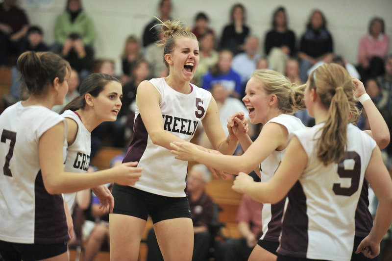 Sara Warnock leads the Greely celebration that includes Haleigh Roach, 7, and Danielle Cimino, 9, as the Rangers earned a spot in the Class A semifinals, beating Yarmouth.