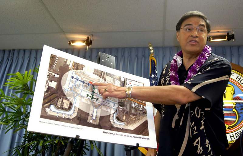 Honolulu Mayor Mufi Hannemann discusses a newly proposed rail station at the Honolulu International Airport during a news conference earlier this year. Republican Gov. Linda Lingle announced recently that she wouldn’t sign off on the federally subsidized project until an updated economic study is conducted.
