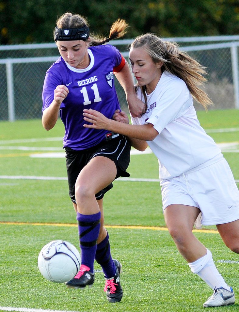 Amanda Masse of Deering controls the ball and looks for a way past Abigail Houghton of Cape Elizabeth. The Capers play Scarborough next.
