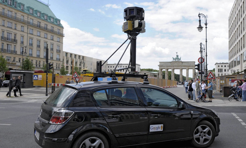 A Google mapping car records street views in Berlin. The use of such vehicles to also log locations of Wi-Fi networks has sparked privacy concerns.