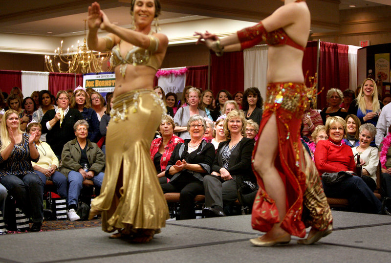 Belly dancers Emma Holder, left, and Rosa Noreen perform during the A Dash of Diva: Girls’ Night Out in Portland. A portion of the event’s proceeds will be donated to the Maine Women’s Fund and the Press for Higher Education Scholarship Fund.