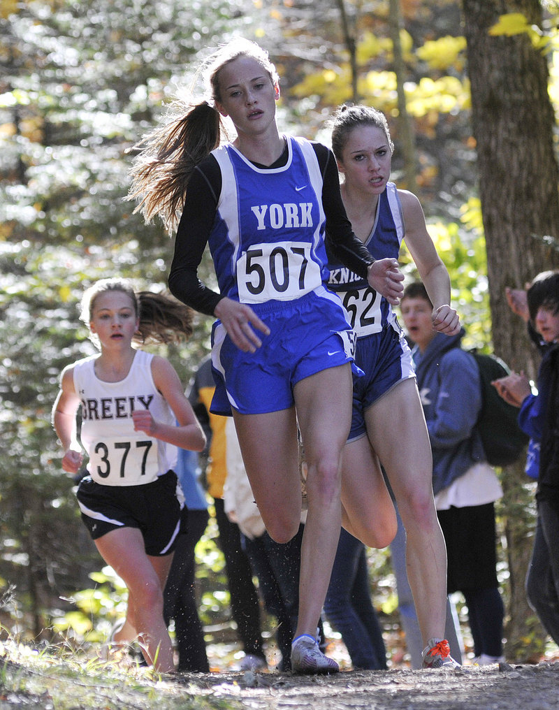 Heather Evans of York, who won the Western Maine Conference title, strides to a third-place finish in Western Class B, less than 6 seconds behind the winner, Abby Mace of Maranacook.