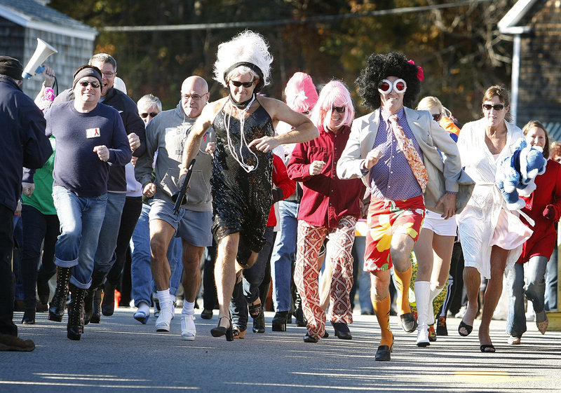 The High Heel Dash kicks off in Perkins Cove during Ogunquit Fest on Saturday. Competitors wear heels at least 2 inches high.