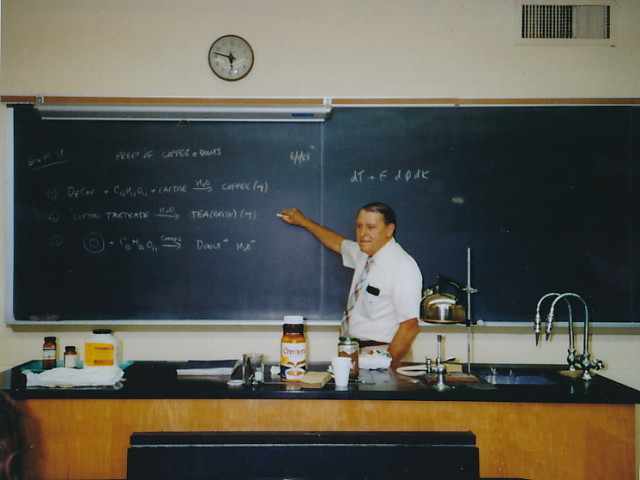 Family photo Walter Bunce Spencer Jr. teaches at a blackboard in 1979 during his tenure as a science teacher.