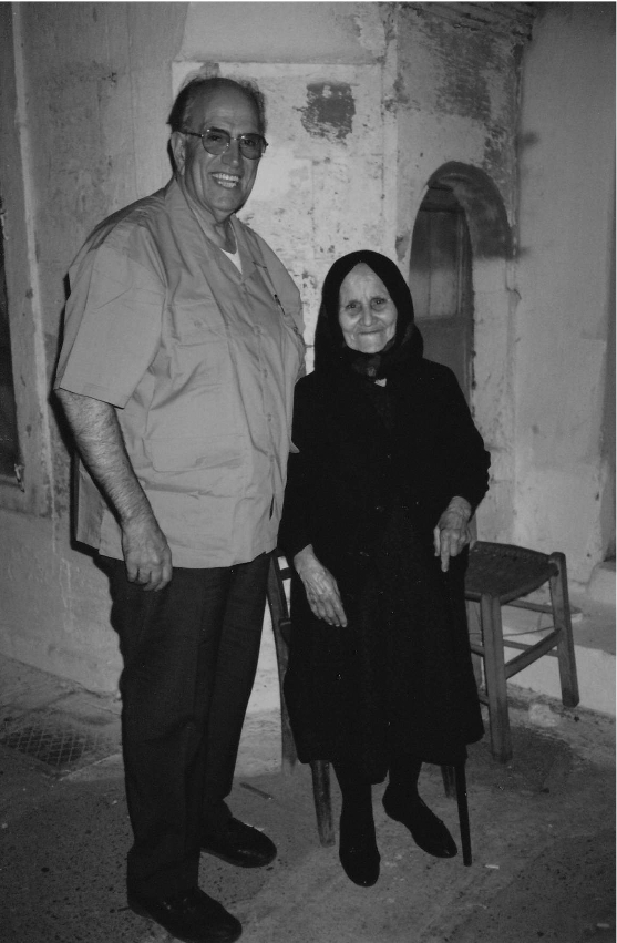 John Anagnostis poses with a Greek woman on one of his many trips to Greece.