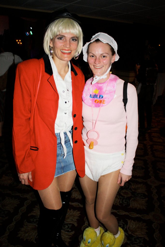 Deb Fox, who won the prize for Hollywood Knockout dressed as Julia Roberts in “Pretty Woman,” and Michelle Fox, dressed as a baby.