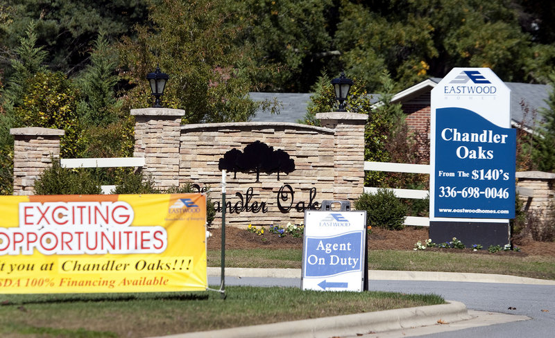 Home sales, like this heavily advertised Chandler Oaks development in McLeansville, N.C., will continue to struggle in the near term until job growth gains real traction, said Larry Yun, chief economist at the National Association of Realtors.