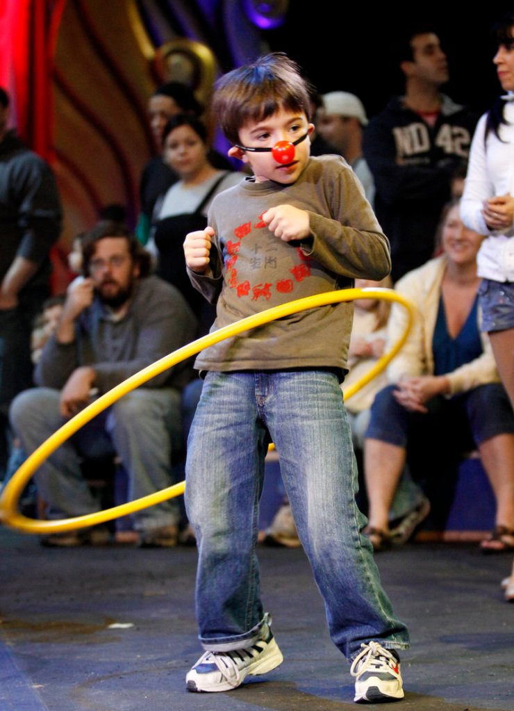 Alessandro Lombardo, 7, of Cape Elizabeth hula-hoops it before the start of the Ringling Bros. and Barnum & Bailey Circus performance Thursday.