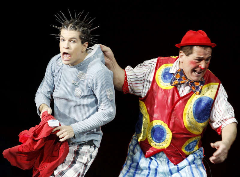 Stevie Caveagna and his father Artiduro Caveagna perform a hair-raising sketch as part of the crowd-pleasing circus at the civic center.