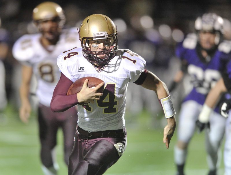 Thornton Academy quarterback Josh Woodward finds room down the field. Woodward scored on a 14-yard run in the second quarter at Deering High.
