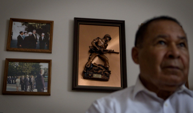 A plaque of a Marine hangs in the Fayetteville, Ga., home of Thomas J. Woods, 78, a Marine veteran of the Korean War. The stories of Woods and other black veterans who served among the military’s first desegregated units offer a history lesson amid the debate over gays in the military.