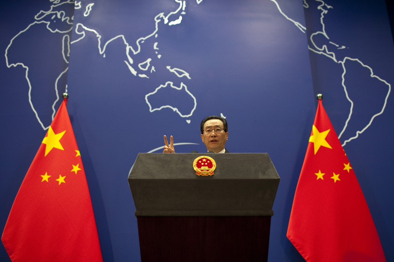 Chinese Vice Foreign Minister Wu Dawei gestures while speaking at a press briefing in Beijing today. The Chinese envoy called for an emergency meeting of North Korean nuclear disarmament talks to discuss the tensions on the Korean peninsula.