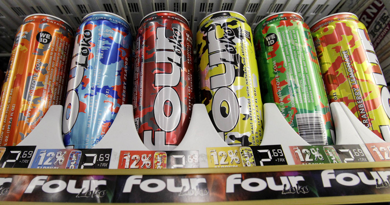 Four Loko alcoholic energy drinks in a cooler of a Seattle convenience store. Phusion Projects, which manufactures the popular brand, says it will reformulate the drinks and remove the caffeine.