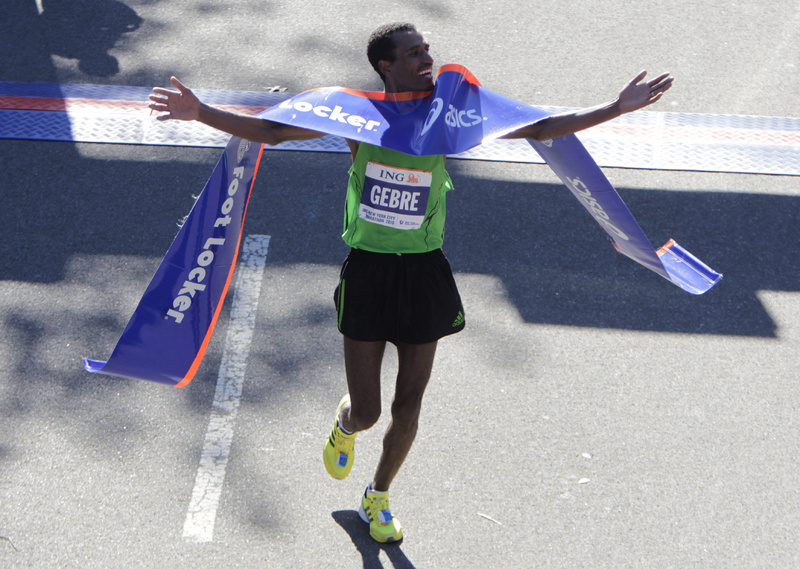 Gebre Gebremariam, of Ethiopia, crosses the finish line first in the men's division at the 2010 New York City Marathon in New York today. Gebremariam won the men's title at the New York City Marathon in his debut at the distance.