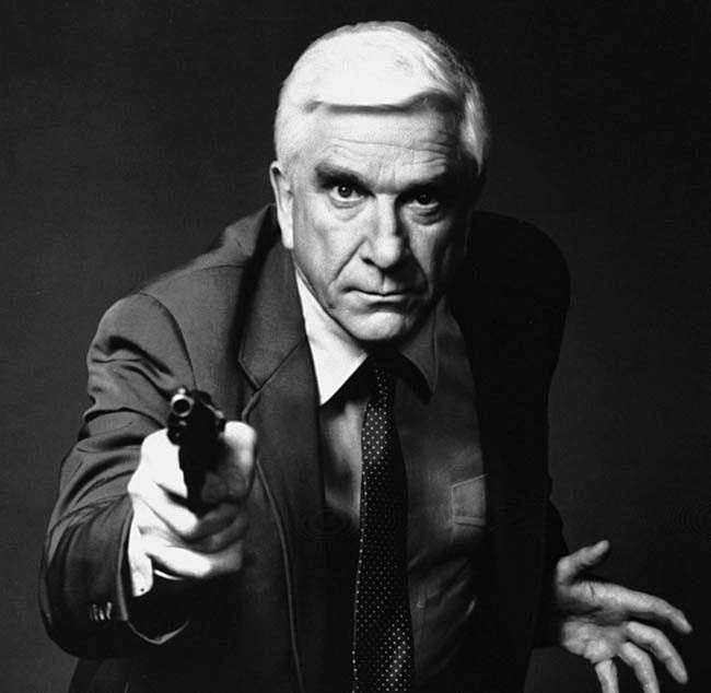 A 1988 of Leslie Nielsen as Lt. Frank Drebin in the movie "The Naked Gun: From the Files of Police Squad!"