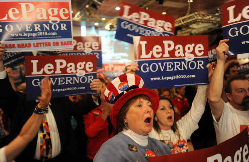 Staff photo by Michael G. Seamans Paul LePage supporters watch as poll numbers roll in at the election night party at Champions in Waterville Tuesday night.