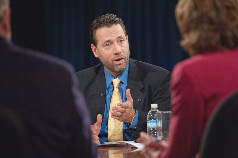 Joe Miller, Republican candidate for U.S. senator in Alaska, makes a point in a debate last week. Miller has admitted lying about using government computers for political work.