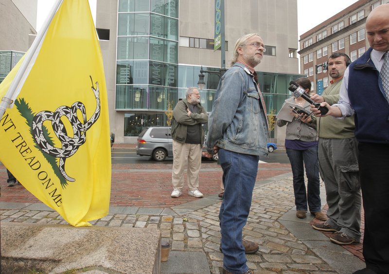 Pete Harring of Standish, head of the Maine ReFounders, a tea party organization in Maine, speaks during a news conference in Monument Square on Thursday.