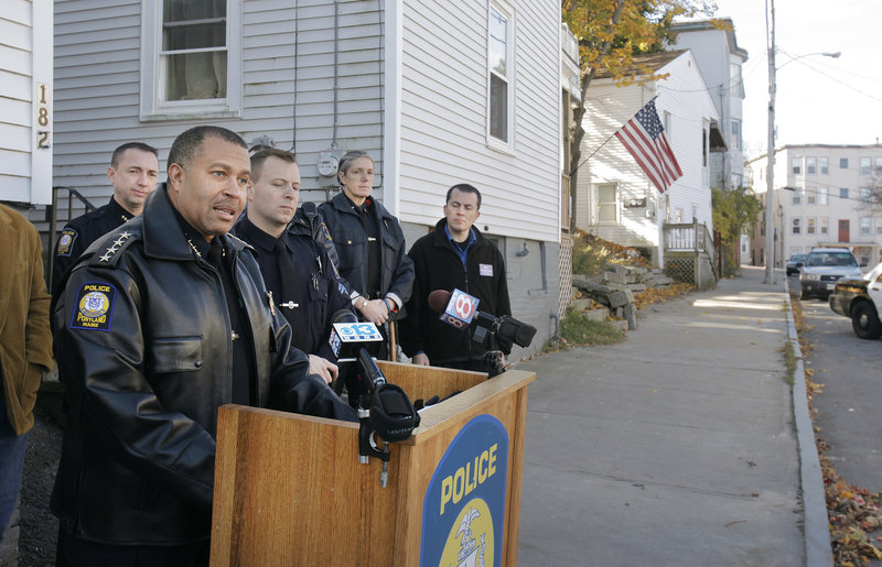Portland Police Chief James Craig talks to the media along Grant Street in Portland on Monday, explaining his department's efforts to combat drugs, drug dealing and inattentive landlords in the Parkside neighborhood.