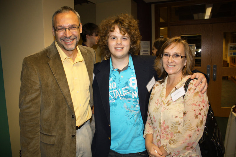 Dean's Scholarship recipient Jordan Maroon, flanked by his father, Derek Maroon, and his mother, Gayle Maroon.
