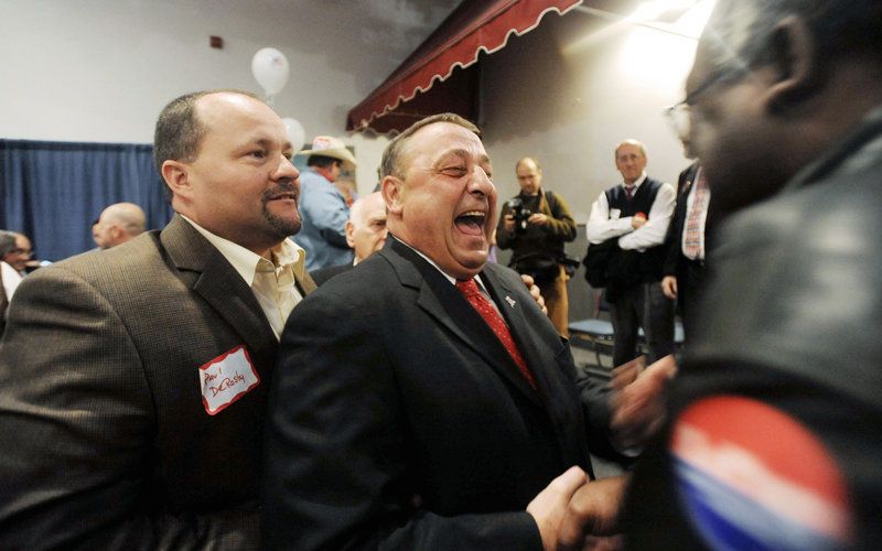 Gov.-elect Paul LePage celebrates with supporters in Waterville as the votes were being counted Tuesday night.
