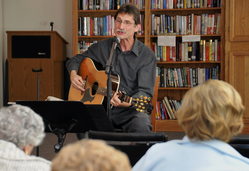 Dave Fisher plays guitar and sings for residents of Wardwell Nursing Home in Saco. Fisher overcame stage fright and now plays more than 400 shows a year.