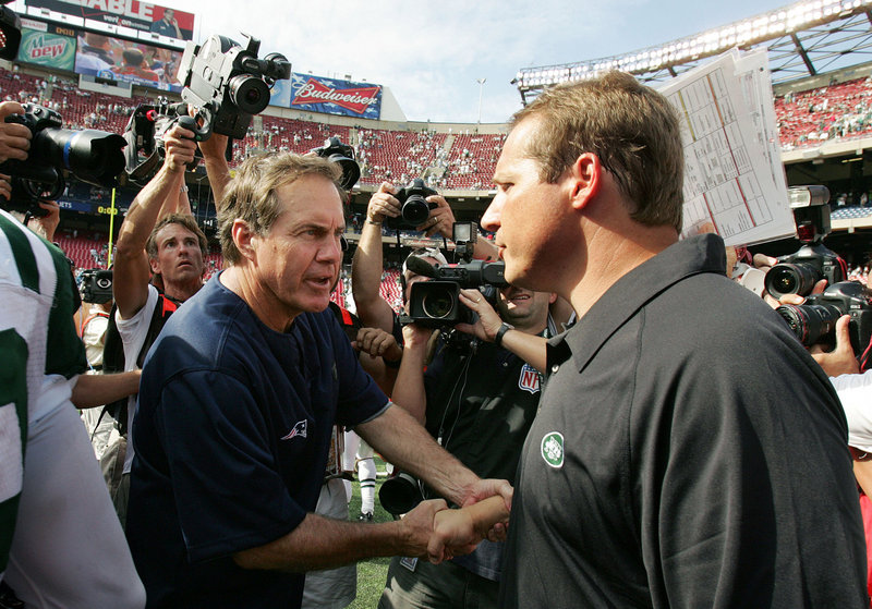 The postgame handshakes between Patriots Coach Bill Belichick, left, and Browns Coach Eric Mangini have been less than cordial, the result of Mangini leaving New England in 2006 to become the Jets’ head coach.