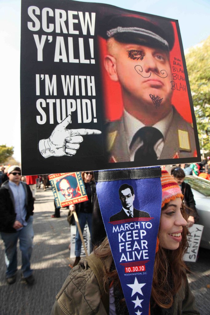 Leah Fein, 17, of Philadelphia, holds a sign portraying conservative commentator Glenn Beck, as thousands gather for the “Rally to Restore Sanity and/or Fear,” led by John Stewart and Stephen Colbert of Comedy Central. The rally was held Oct. 30 on the far eastern end of the National Mall in Washington.
