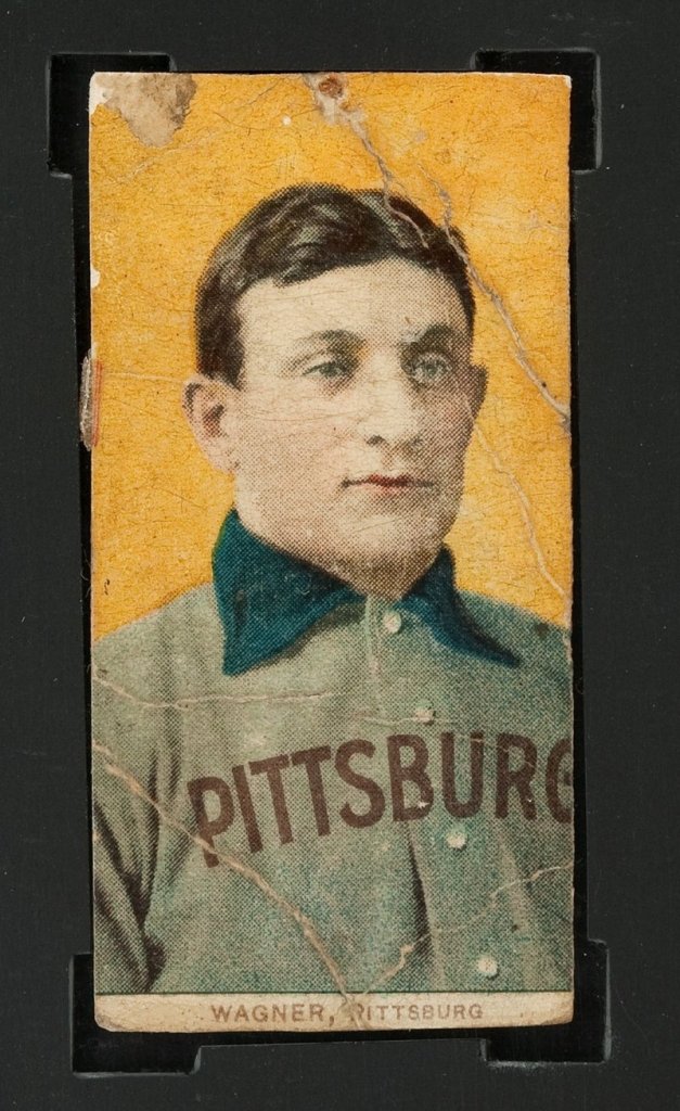 This photo provided by Heritage Auctions shows a century-old T206 Honus Wagner baseball card. It’s the most sought-after baseball card in history.