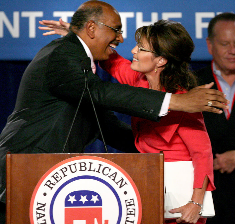 Former Alaska Gov. Sarah Palin hugs Republican National Committee Chairman Michael Steele during a rally in Orlando, Fla., on Oct. 23. Steele embraces Palin’s ability to galvanize voters, calling it “a very powerful force in politics.”