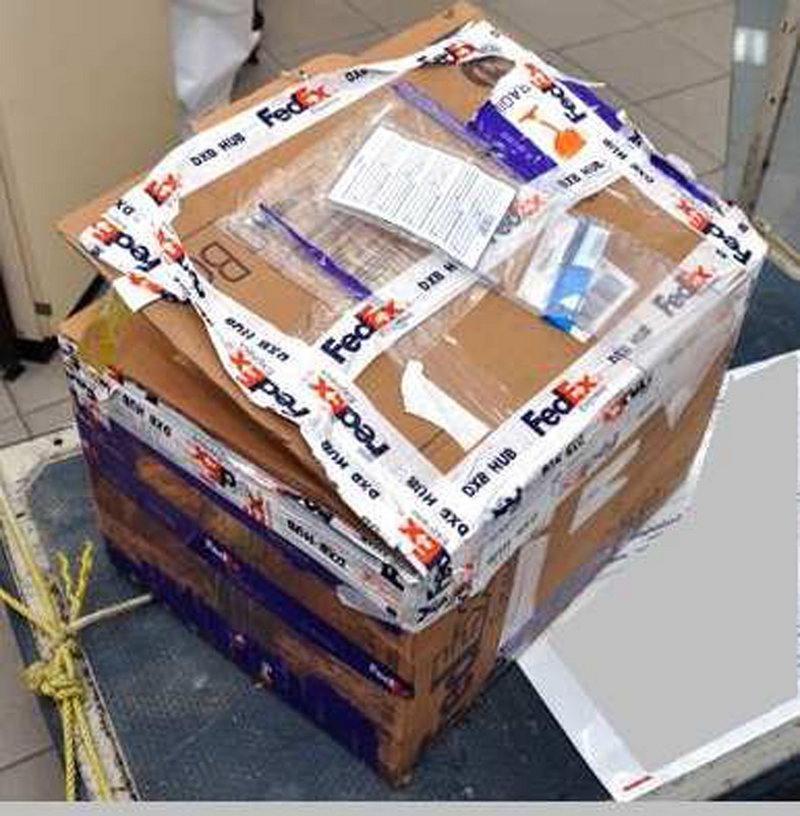 Photo released by Interpol on Saturday shows the FedEx Express package seized at FedEx Cargo Handling Centre, Dubai Airport, which was headed for the United States.