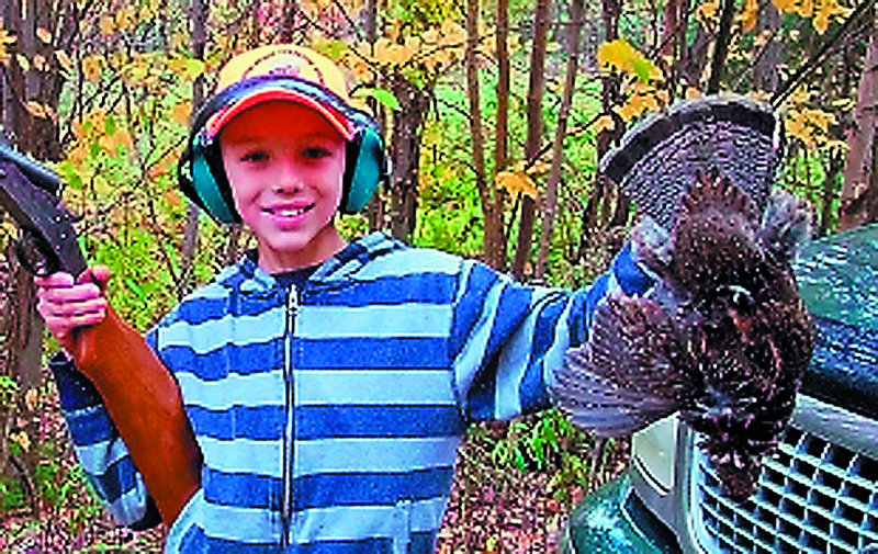 Kevin Collins, ll, of Fairfield bagged his first partridge in October while hunting with his uncle, Gene Collins, near Moosehead Lake.
