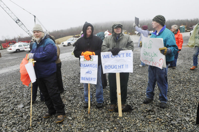 Protesters rally at the Rollins Mountain project in Lincoln on Nov. 8. They say that the impact of wind farms on the landscape and nearby residents outweighs the benefits.