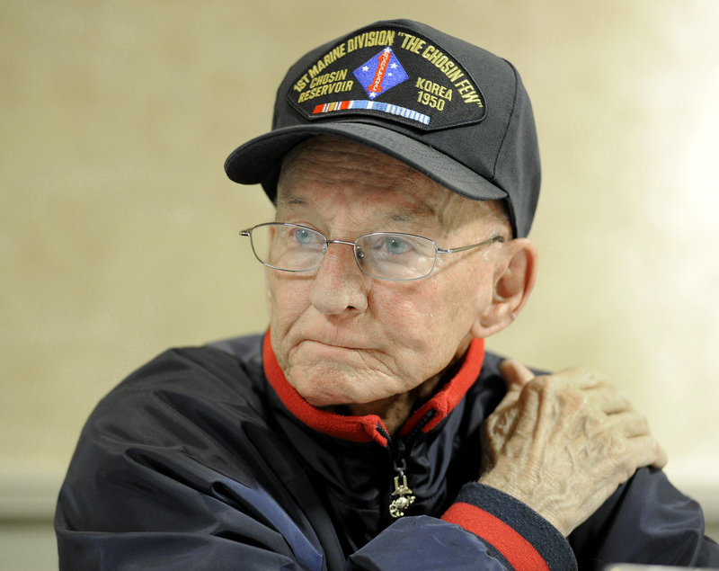 Jim Hughes, 82, of Gorham recalls the frigid Battle of Chosin Reservoir in Korea. He still suffers from the pain of frostbite damage to his feet, hands and legs. “The guys who didn’t come home are the heroes. We’re not heroes. We’re just lucky to be here,” he said.