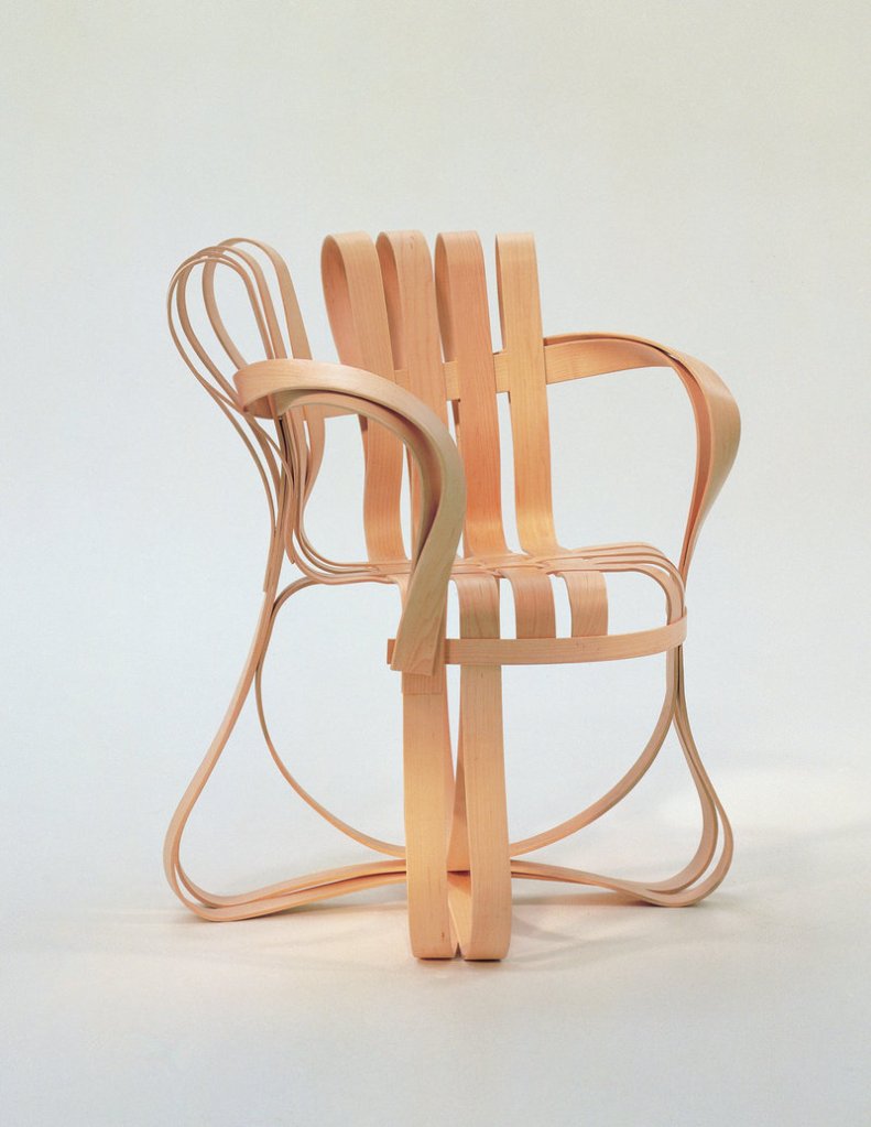 Frank Gehry’s “Cross Check Arm Chair” in laminated maple, ca. 1992