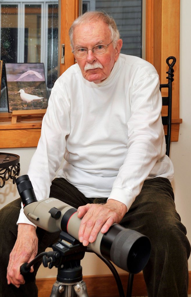 Robert Manns is an avid bird hunter. Here he shows off one of his spotting scopes.