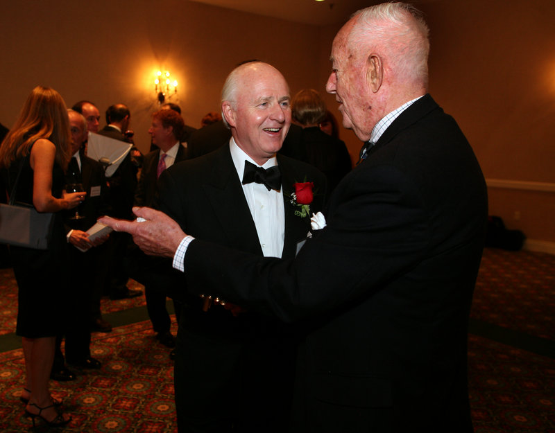 Spurwink Humanitarian of the Year Award winner Richard L. Connor, left, chief executive officer of MaineToday Media, visits with Phineas Sprague during Saturday’s reception at the Portland Marriott at Sable Oaks in South Portland.