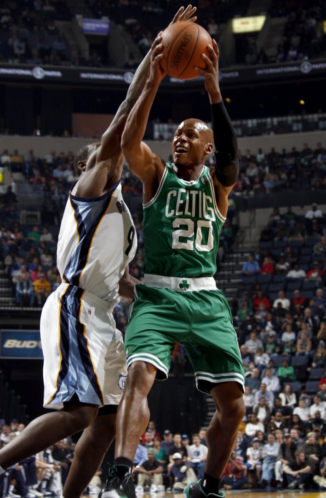 Ray Allen of the Boston Celtics heads to the basket Saturday night while defended by Tony Allen of the Memphis Grizzlies during the first half of the Celtics’ 116-110 victory.